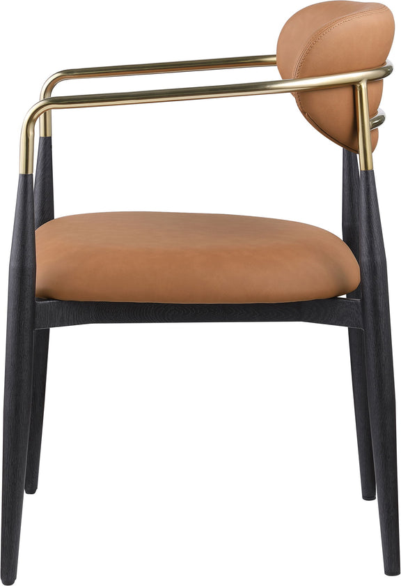 Tan vegan leather dining arm chair with rounded back, black legs, gold arm frame