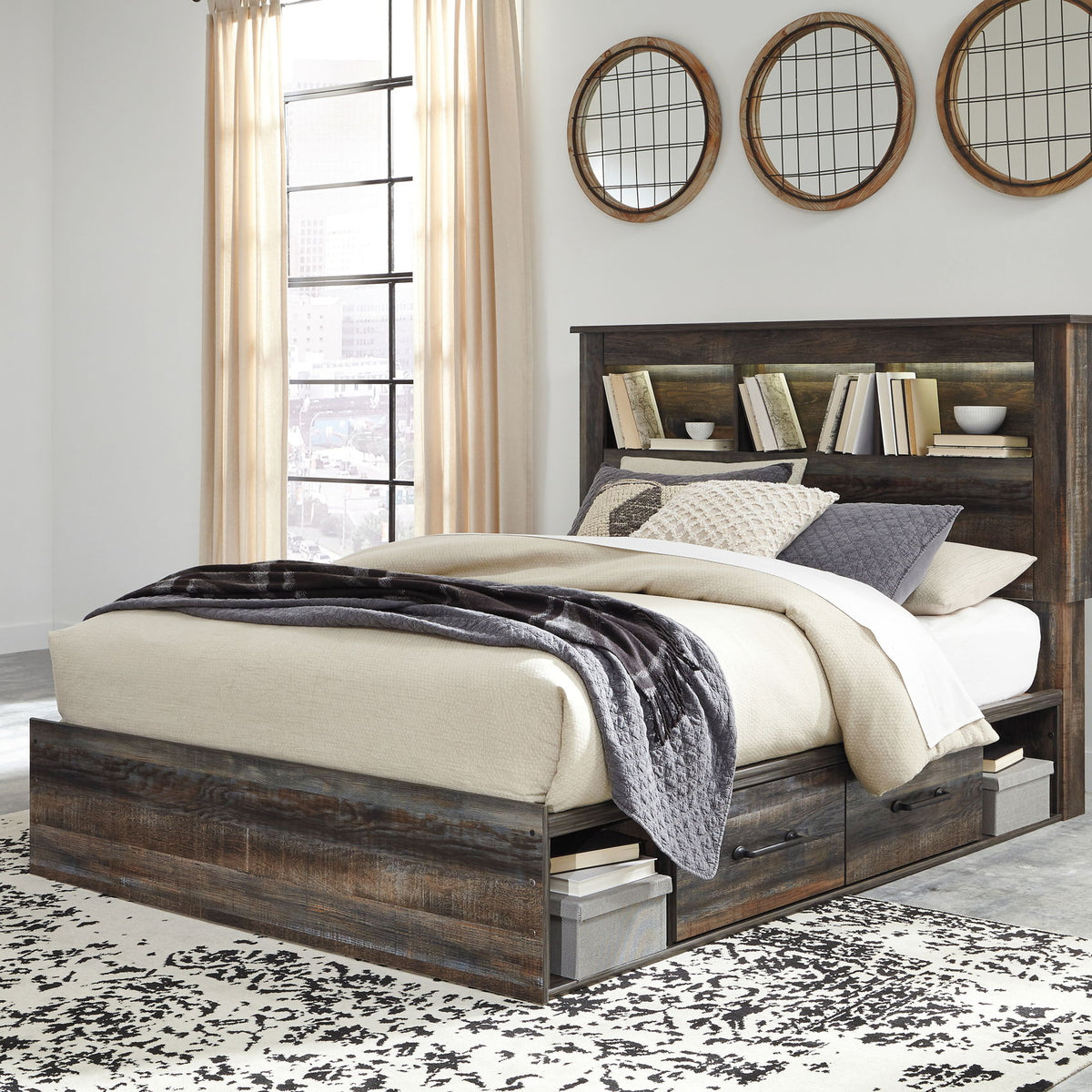 Panel bookcase bed in dark wood with two drawers and bookcase headboard, black and gray throws