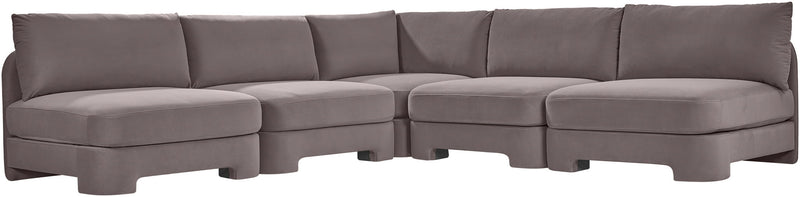 Taupe armless velvet sectional sofa with deep seats and padded back cushions.