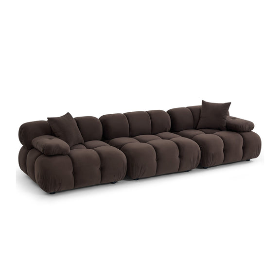 Dark brown modular sectional sofa with tufted seat cushions and two back pillows