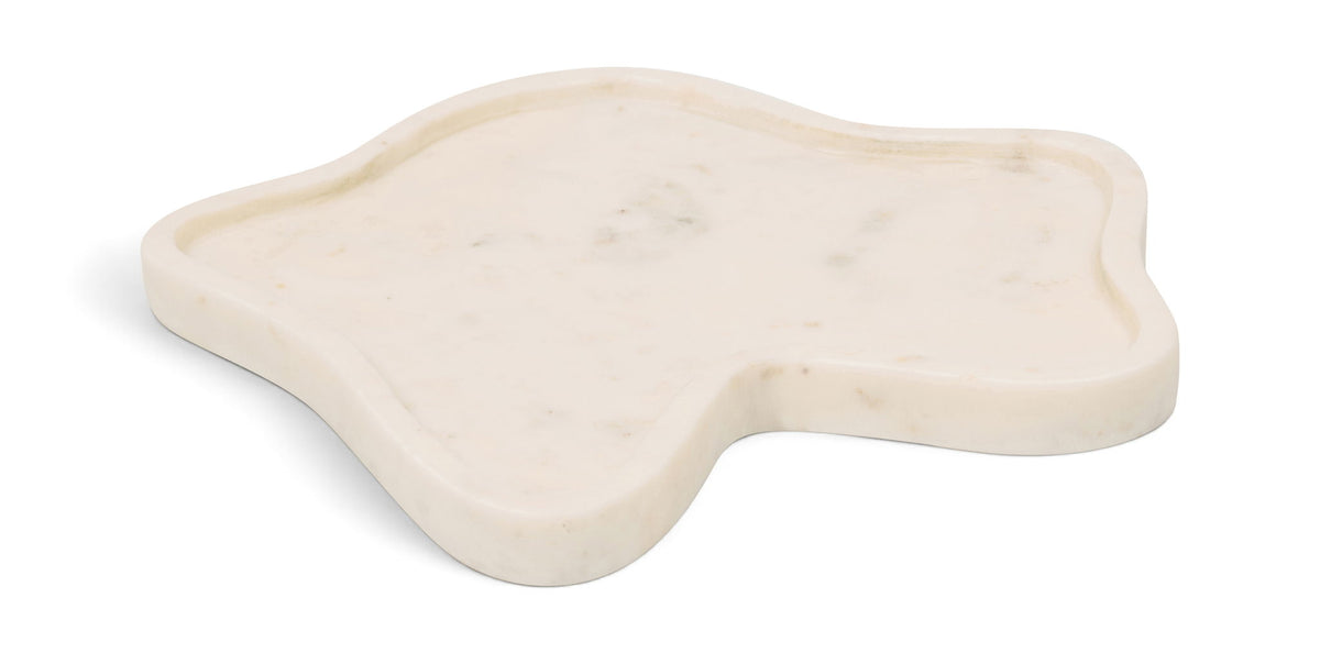 White marble tray with subtle veining and rounded leaf-like edges.