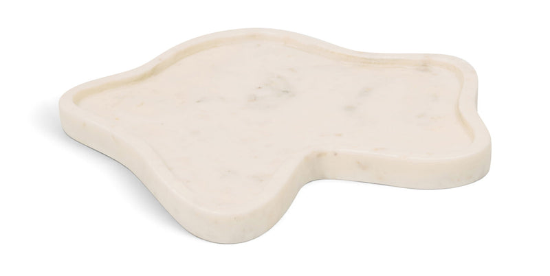 White marble tray with subtle veining and rounded leaf-like edges.