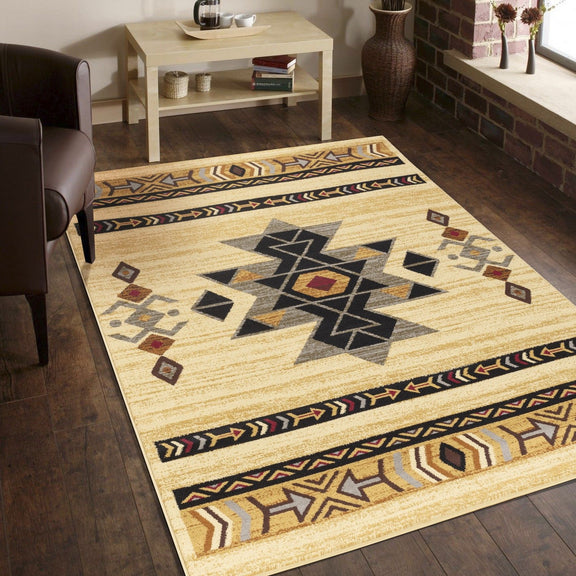 Beige geometric area rug with large central starburst and multicolor border stripe