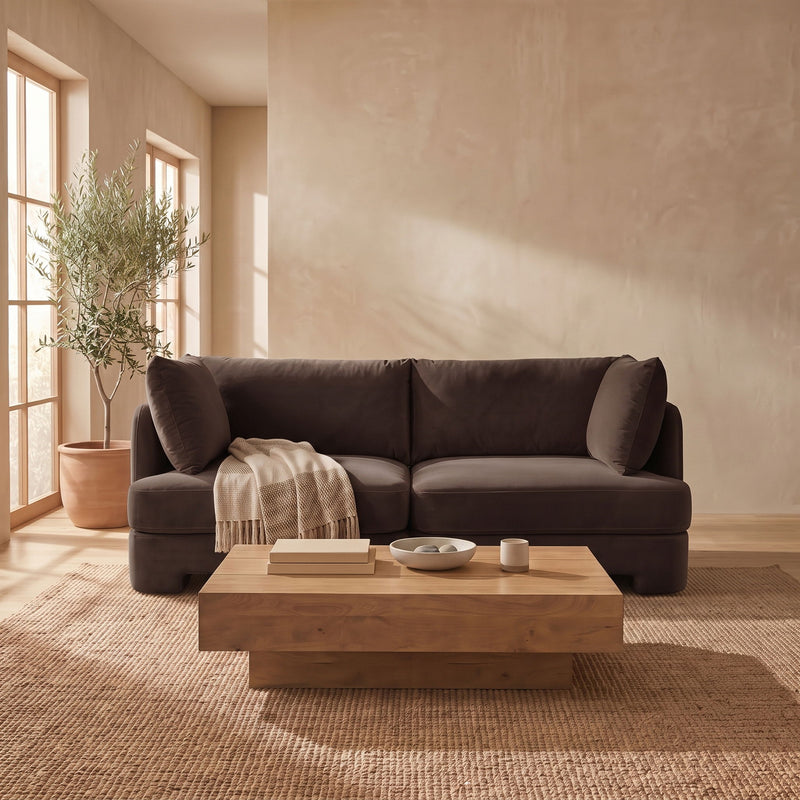 Espresso brown velvet upholstered loveseat with rounded arms and back cushions