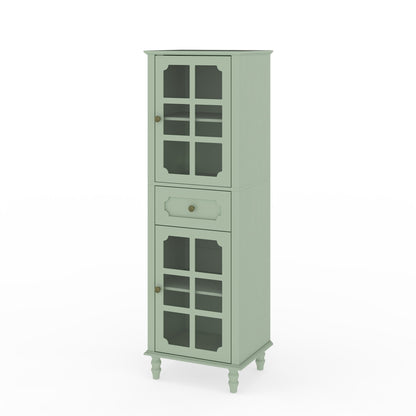 Pale green freestanding curio cabinet with two grid doors, center drawer, and short legs
