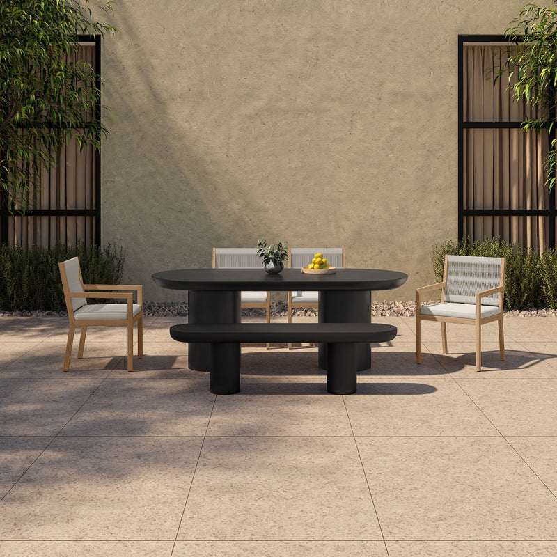Black concrete patio bench with circular tabletop and two pedestal base sections