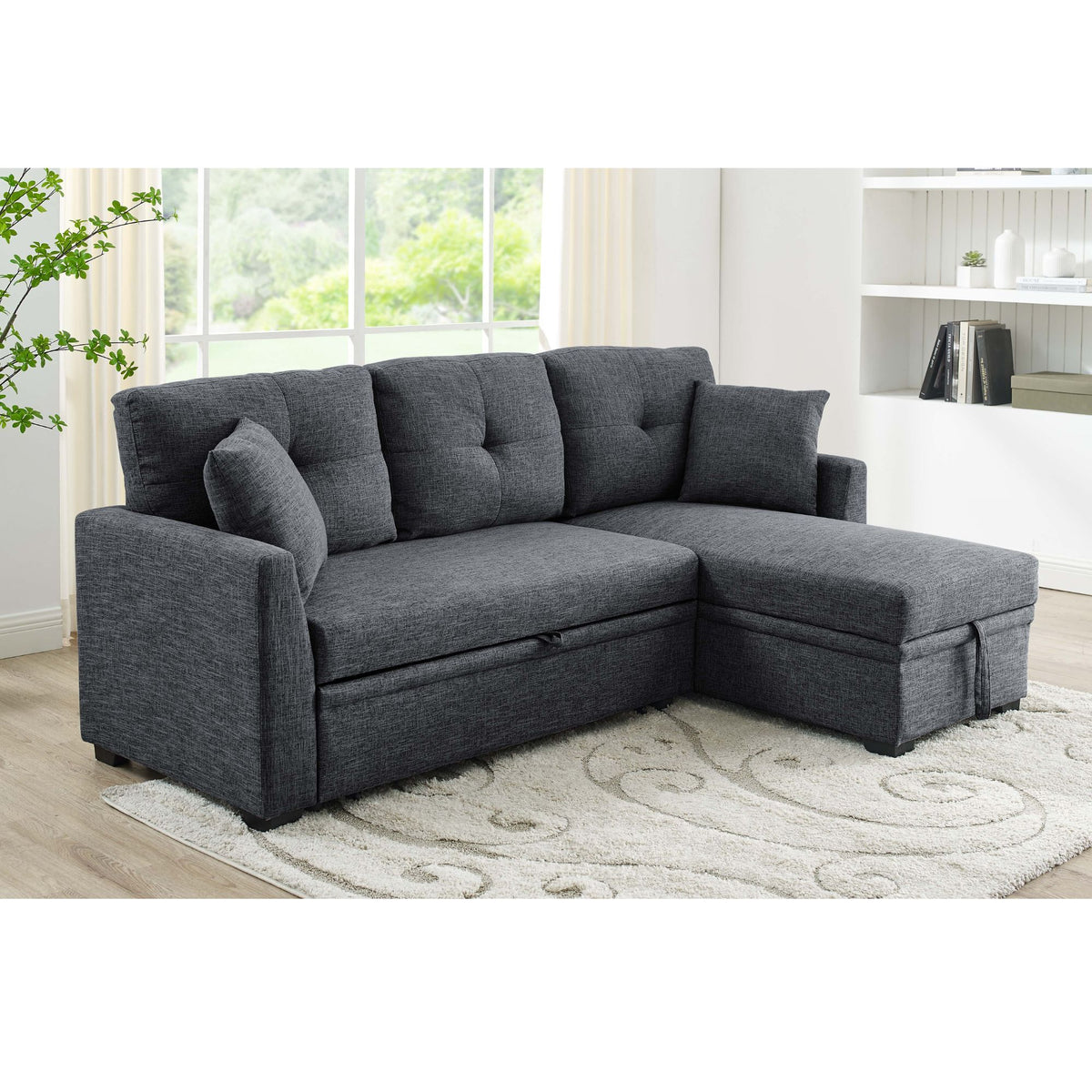 Dark gray upholstered sectional with pull-out bed and storage chaise, corner sofa with tufted cushions