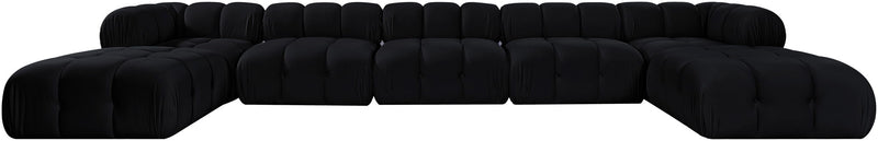 Black 7-piece modular sectional sofa with curved corner seating and ottoman blocks