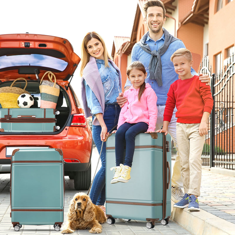 Teal hardshell spinner suitcase with telescopic handle and four wheels.
