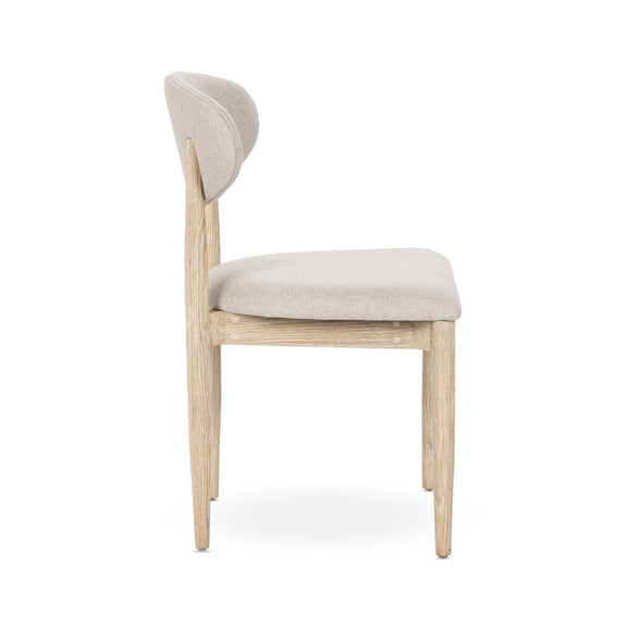 Dining chair with light wood legs and beige upholstered oval back and padded seat