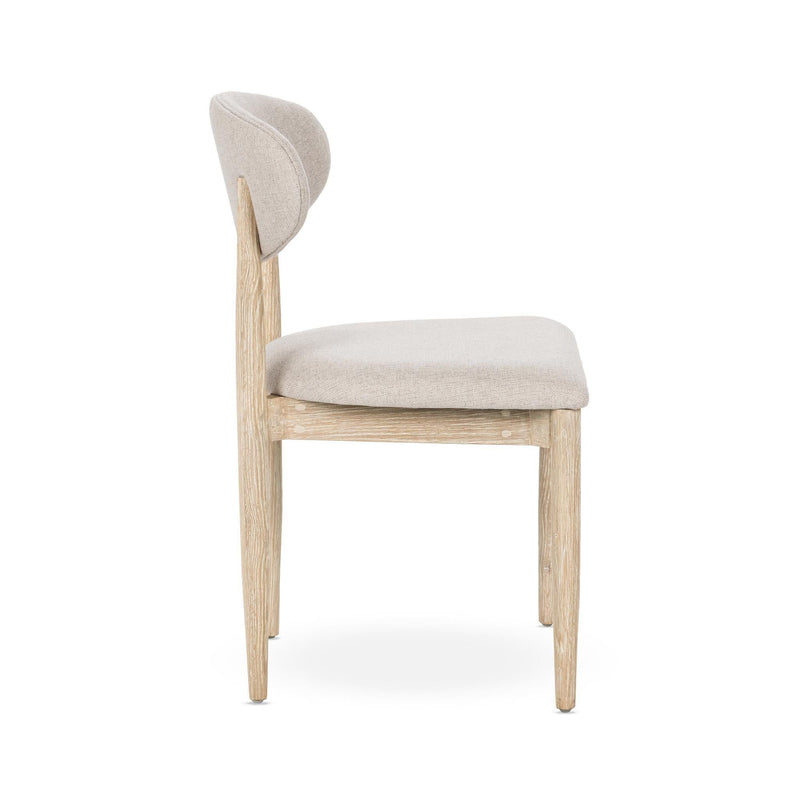 Dining chair with light wood legs and beige upholstered oval back and padded seat