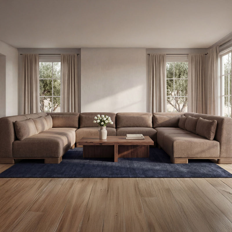 Dark brown U-shaped modular sectional with chaise-style corner seats and back cushions