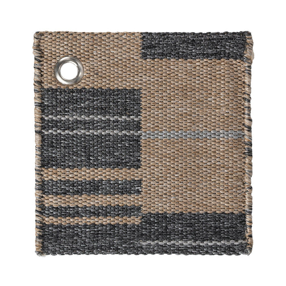 Indoor/outdoor woven rug with tan, gray, and black stripes and a round metal grommet
