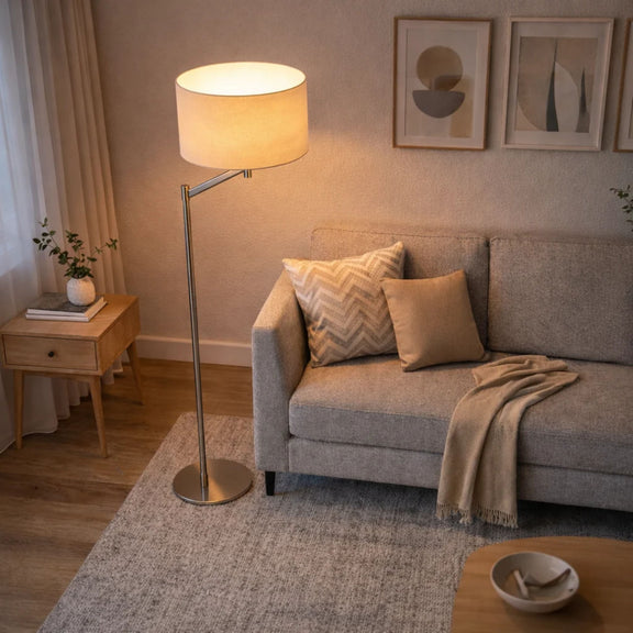 Tall floor lamp with white drum linen shade and brushed nickel rotary switch base