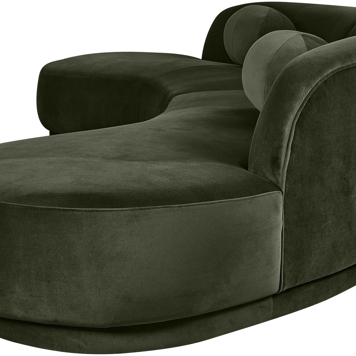 Deep green velvet sectional sofa with wide chaise and rounded armrests