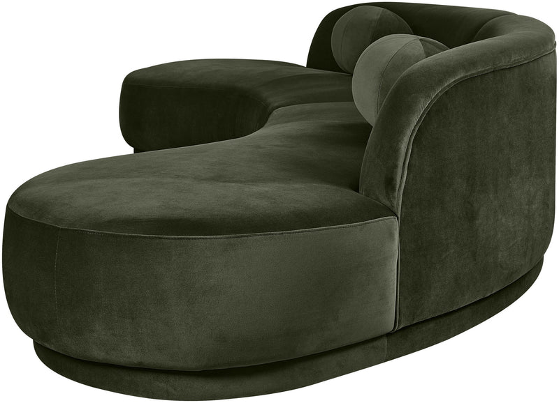 Deep green velvet sectional sofa with wide chaise and rounded armrests