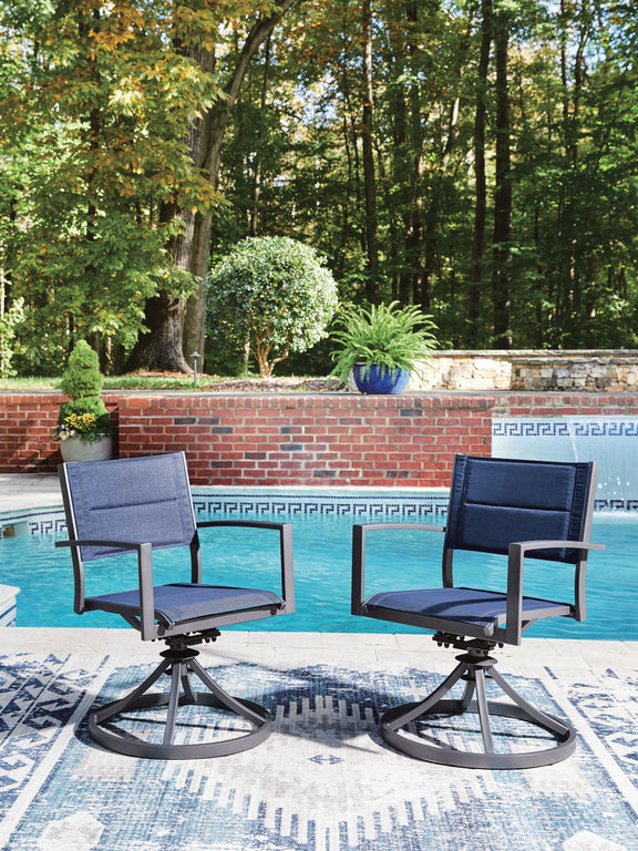 Two blue sling swivel chairs with gray frames and round swivel bases