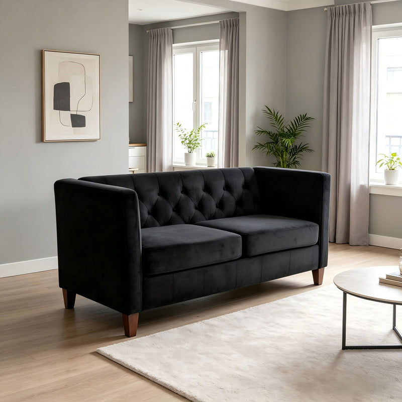 Black button-tufted 2-seat loveseat with square arms and tapered wooden legs