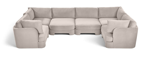 Beige velvet U-shaped sectional sofa with cushioned back and wide armrests