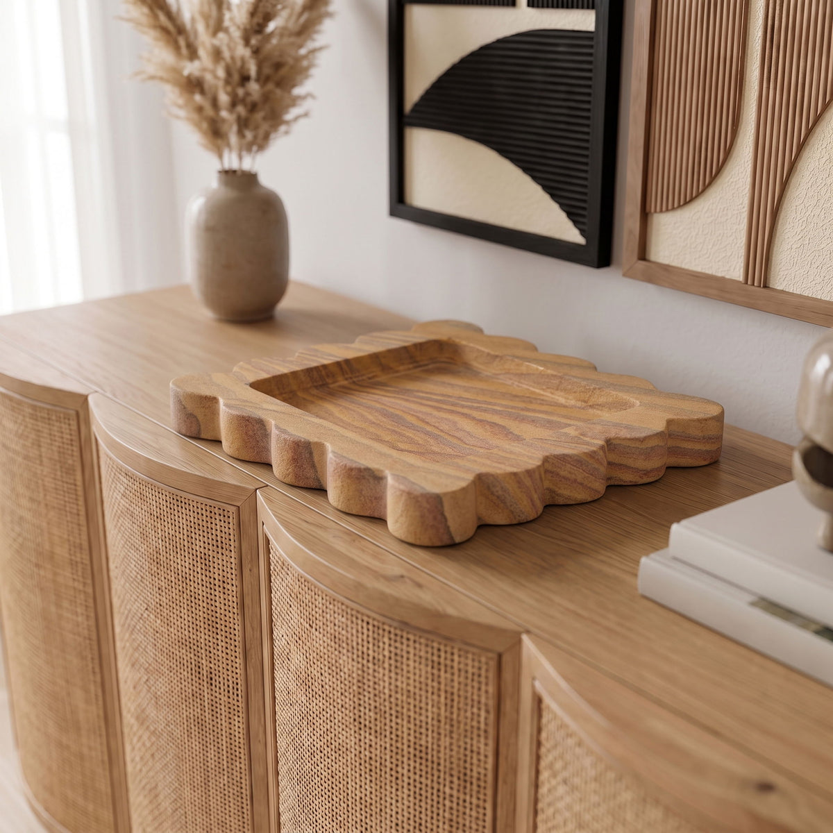 Sandstone wooden tray on cabinet with scalloped edges and striped wood grain