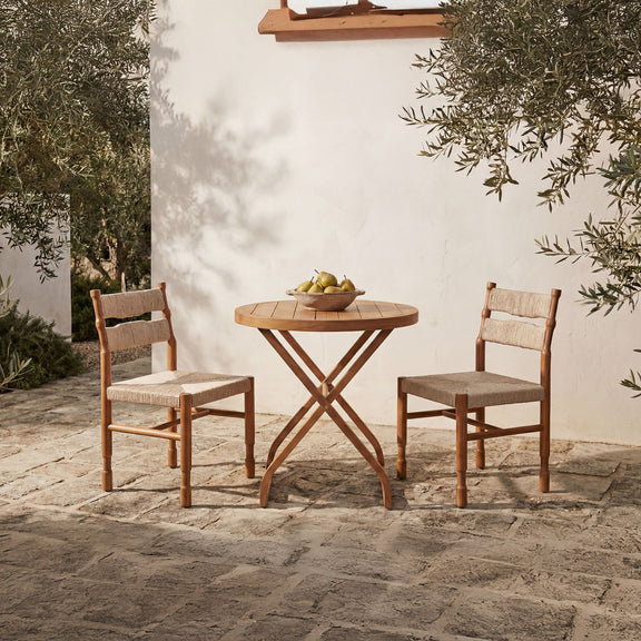 Pair of natural wooden outdoor dining chairs with beige woven seats, side-by-side