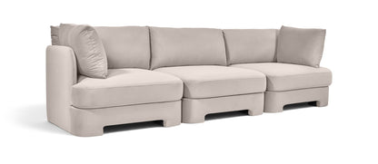 Light gray upholstered 3-piece velvet sofa with tufted seat and back cushions