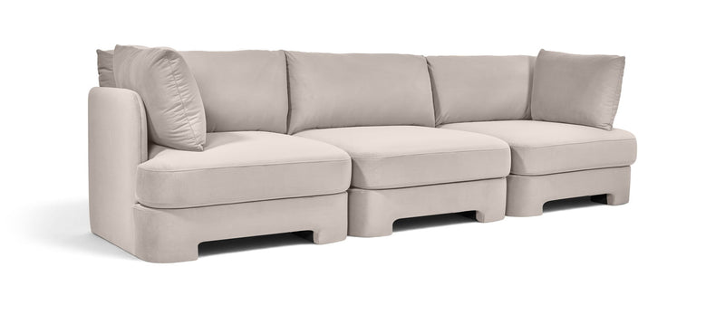 Light gray upholstered 3-piece velvet sofa with tufted seat and back cushions