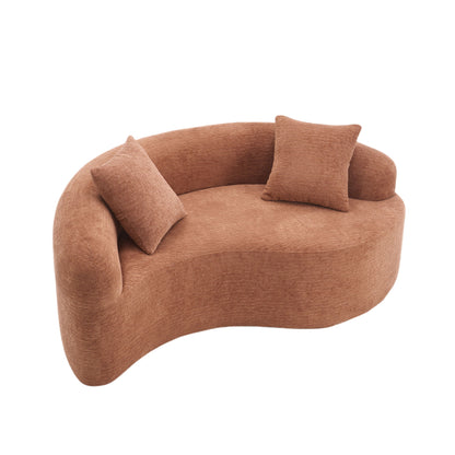 Curved dual depth loveseat in orange with two pillows, deep curved seat and arms
