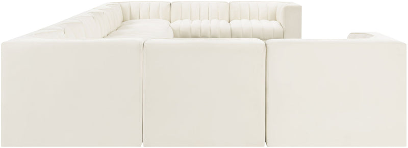 Velvet modular sectional sofa with tufted cushions, off-white upholstery, three front seat panels