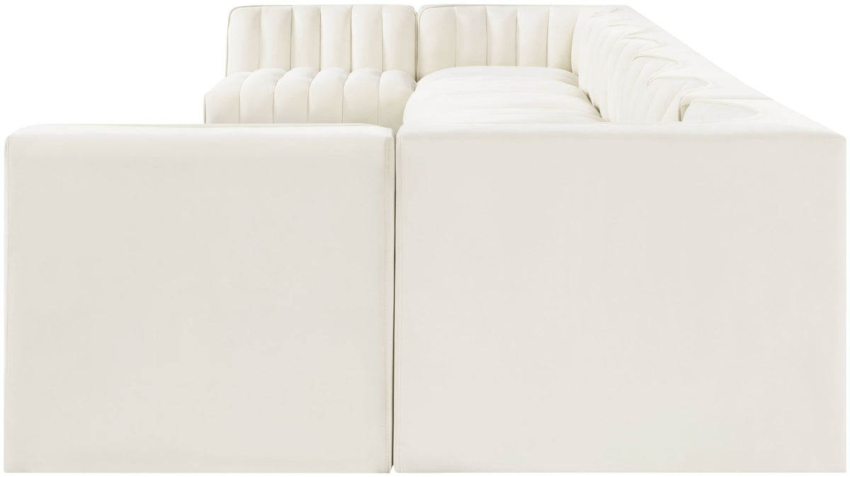 White armless velvet sectional corner unit with deep seats and tufted back cushions