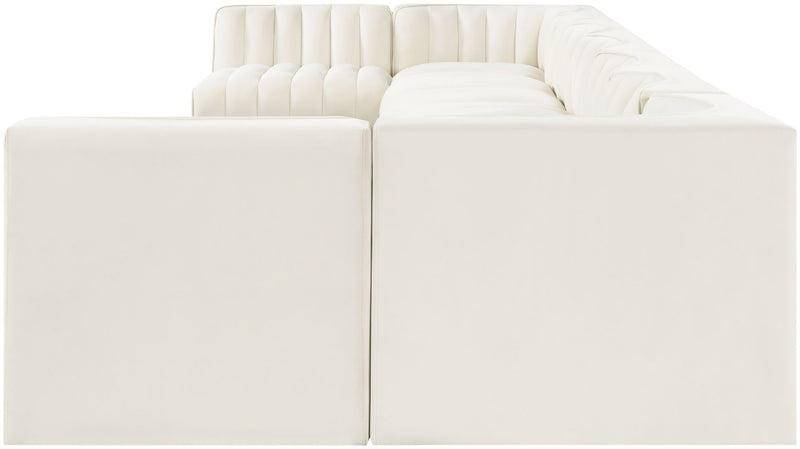 White armless velvet sectional corner unit with deep seats and tufted back cushions