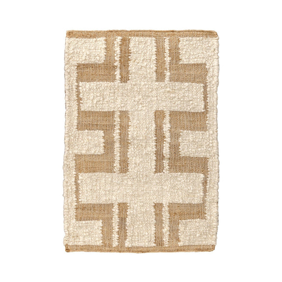 Ivory area rug with tan geometric cross pattern and short loop pile texture