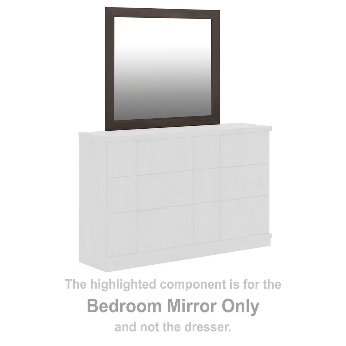 Rectangular dark brown bedroom mirror resting on white cabinet