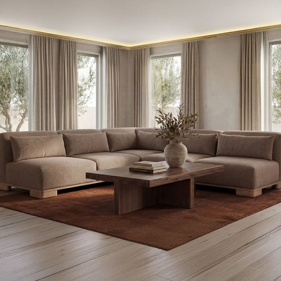 Walnut brown coffee table with rectangular top and central base, wide view.