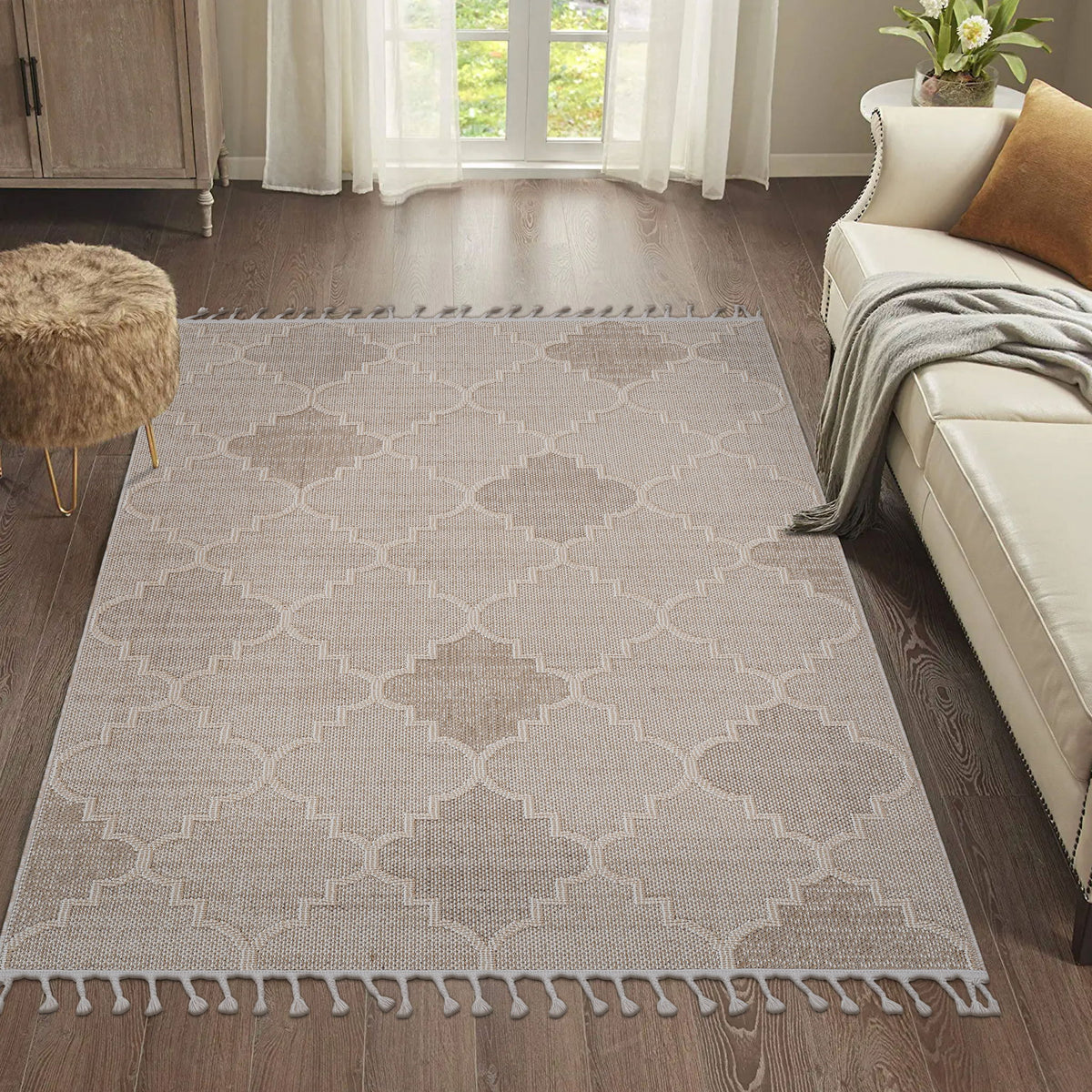 Beige trellis area rug with lattice motif and fringe tassel trim