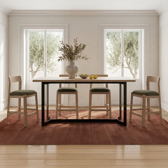 Oak counter table with natural wood top and black metal base