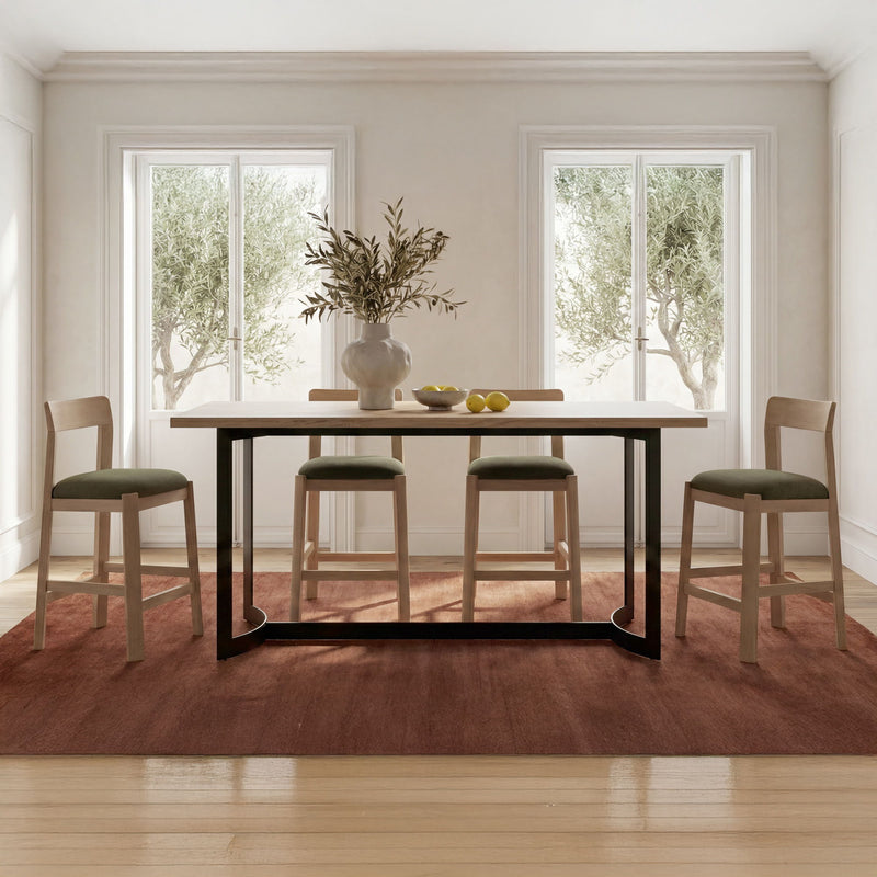 Oak counter table with natural wood top and black metal base