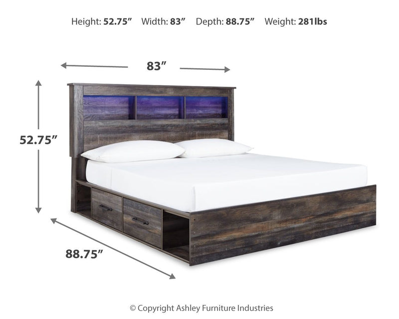 Panel bookcase bed in dark wood with open cubbies, two drawers, and white mattress