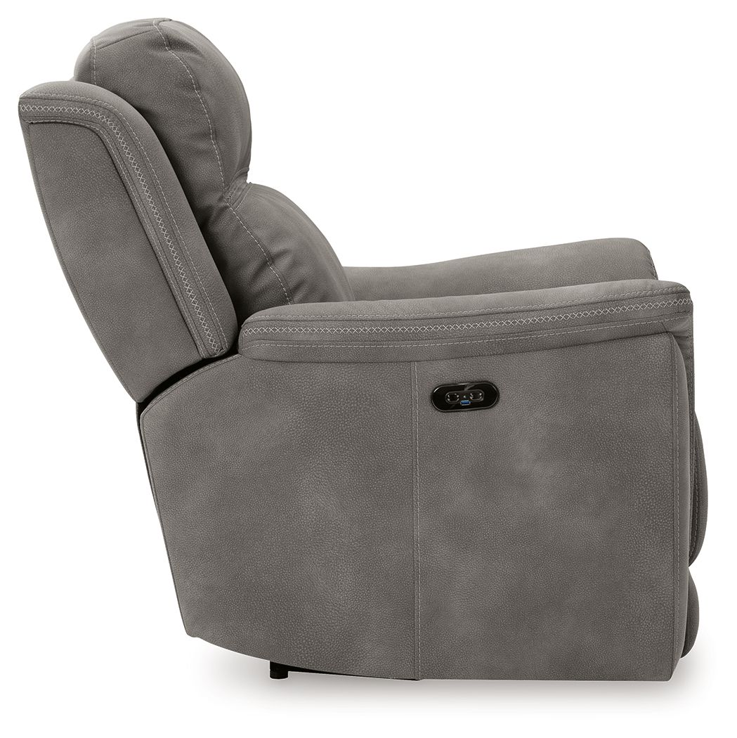 Next-Gen Durapella power recliner, dark gray with side control panel and rounded headrest