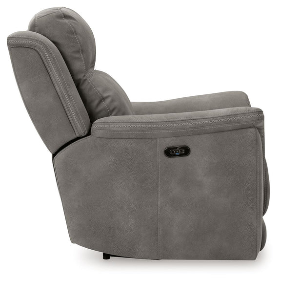 Next-Gen Durapella power recliner, dark gray with side control panel and rounded headrest