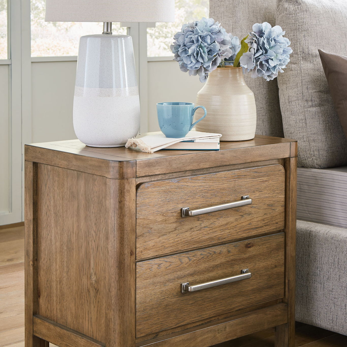Cabalynn - Two Drawer Night Stand - Light Brown