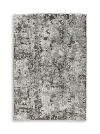 Dark gray area rug with distressed abstract pattern, rectangular