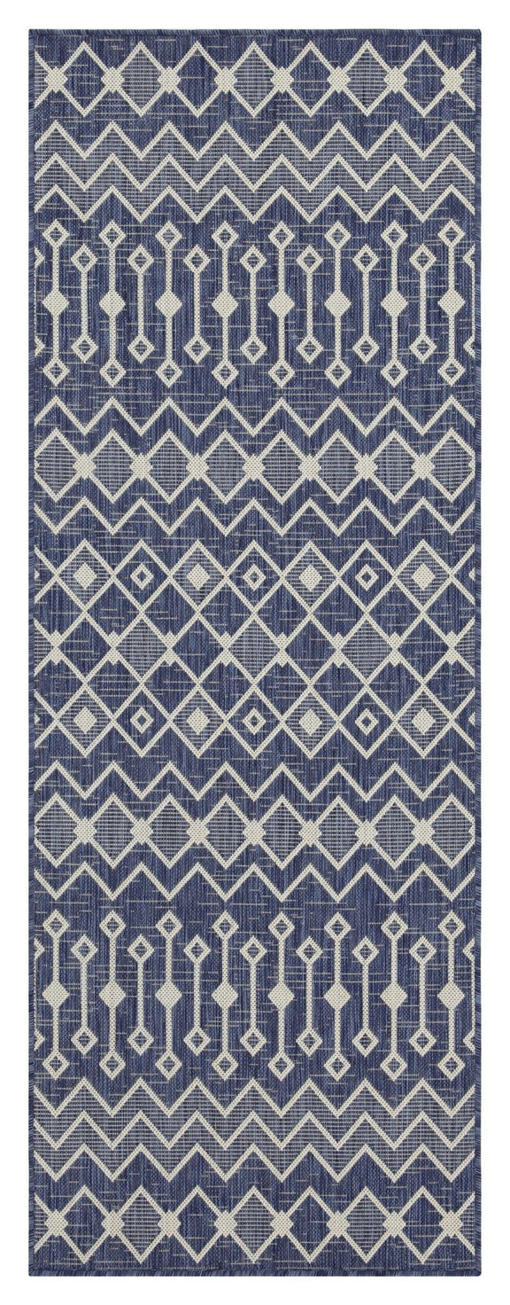 Indoor/outdoor polypropylene area rug, blue with light blue repeating diamond and stripe motifs.