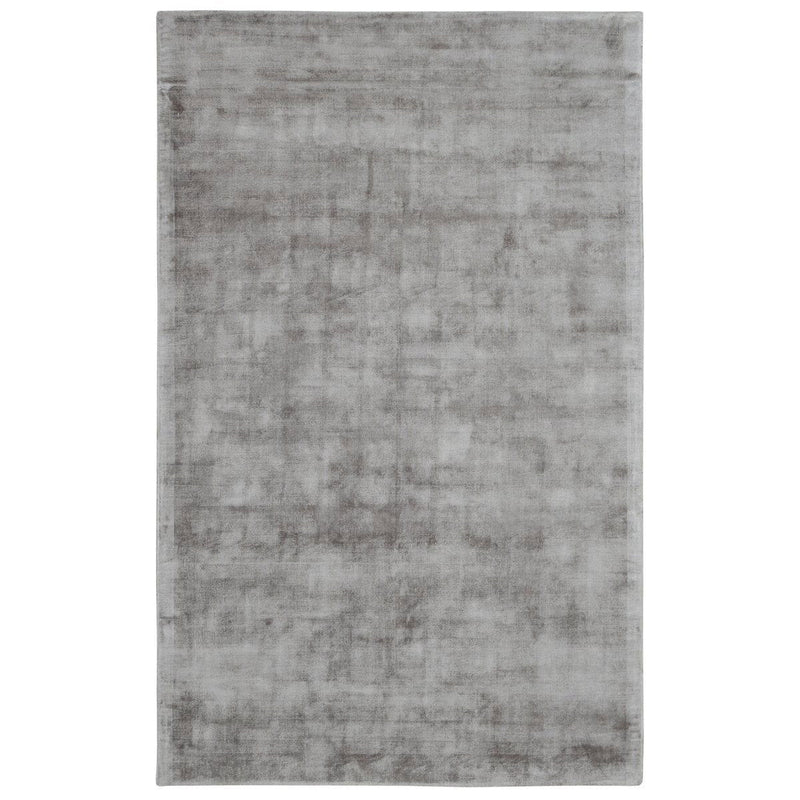 Medium light gray distressed area rug with mottled vintage pattern and flat pile.