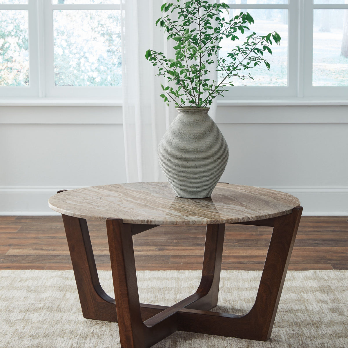 Tanidore - Round Cocktail Table - Warm Brown