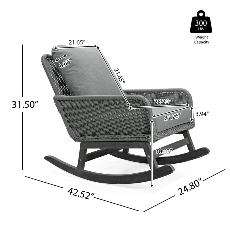Gray wicker rocking chair with gray cushions and curved rocker base