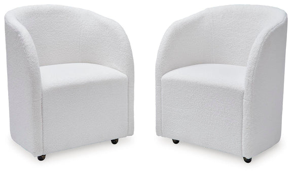 Set of 2 ivory upholstered dining armchairs with rounded backs, padded seats, and dark feet