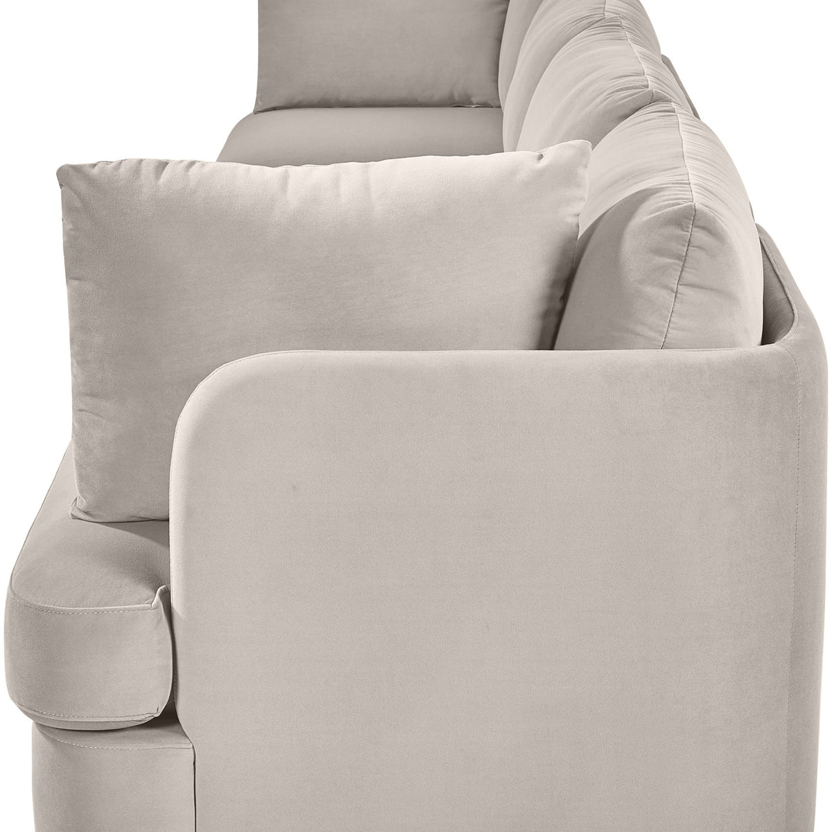 Light gray velvet performance fabric modular sofa with rounded arms and back pillows