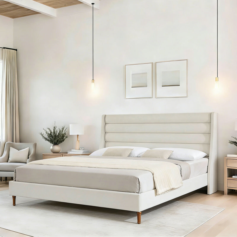 Beige upholstered platform bed with low profile frame and wave headboard