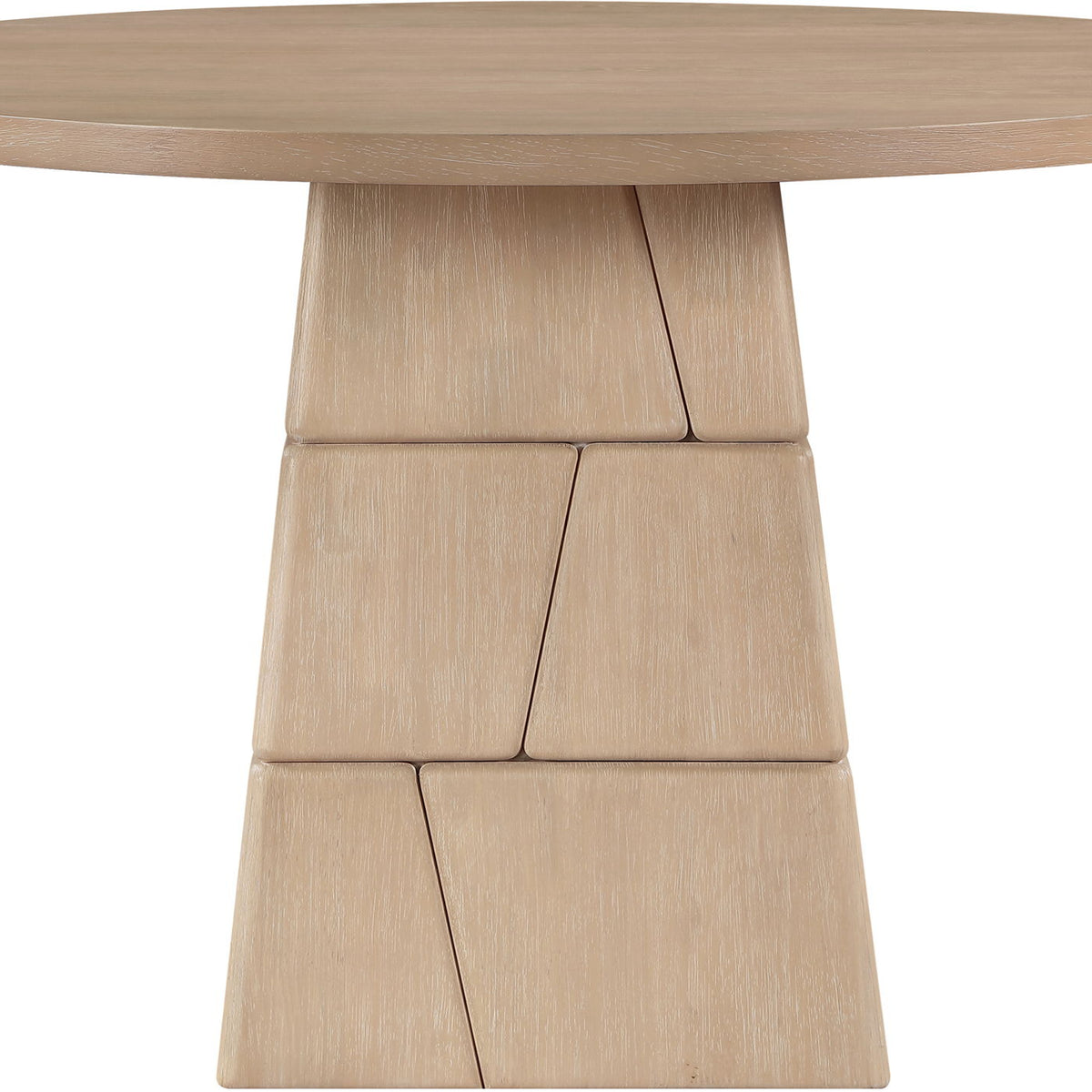 Light brown round dining table with stacked block pedestal base and wide tabletop